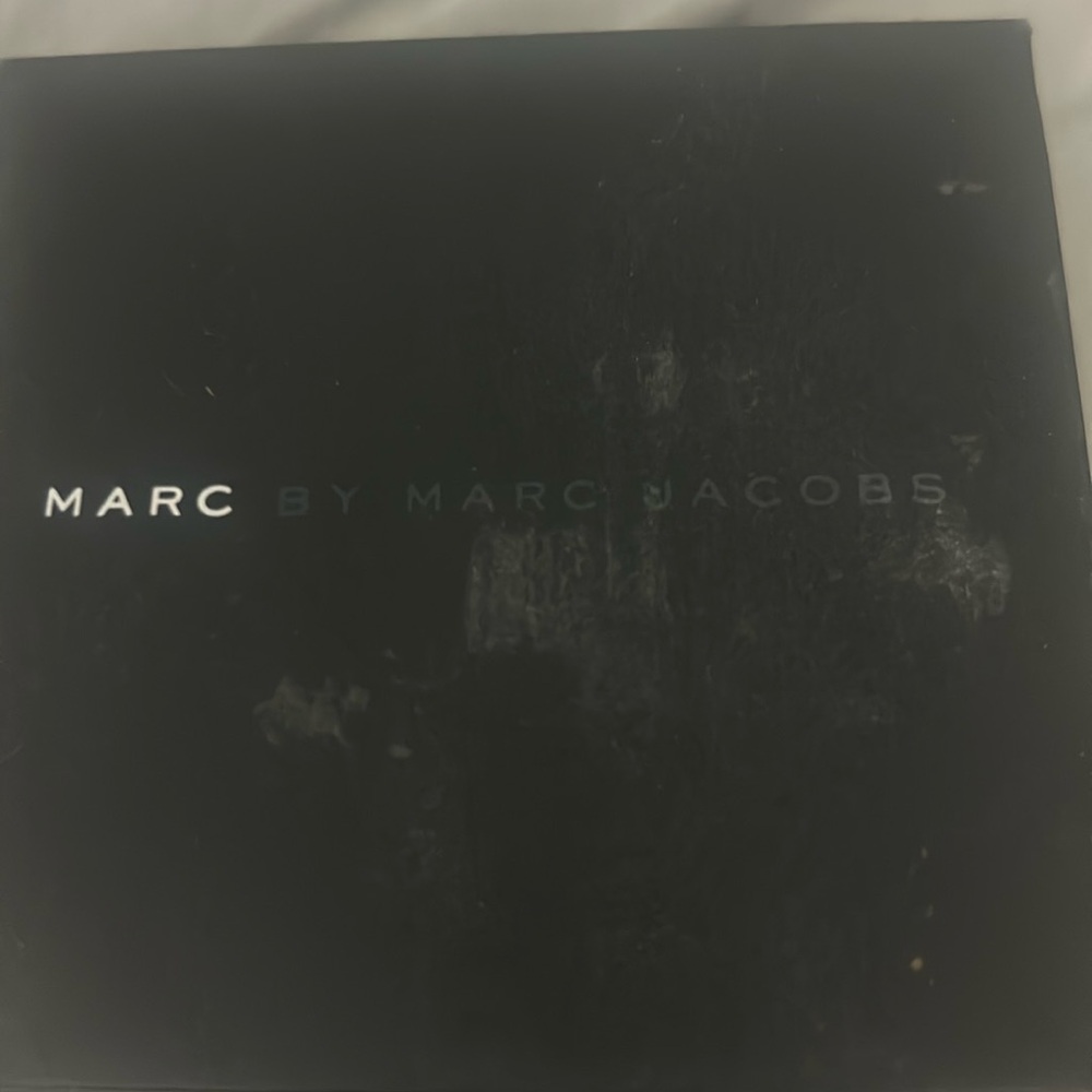 marc jacob’s watch with gold and black band